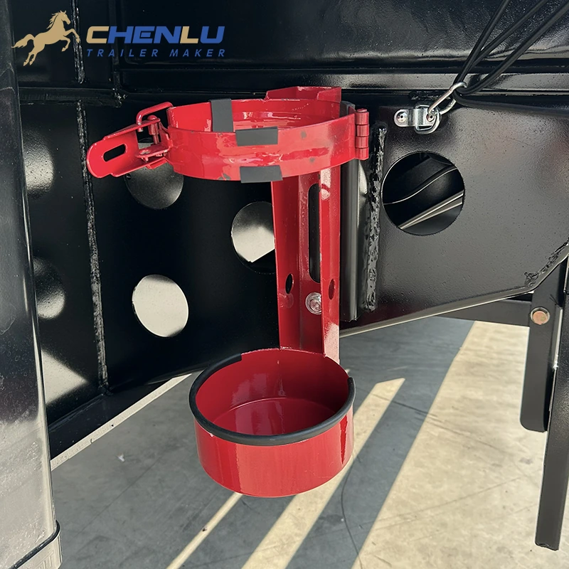 Quick-release fire extinguisher bracket on the trailer frame